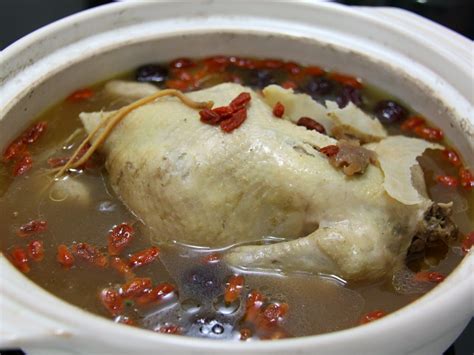 Adding the ingredients in a pot or slow cooker and simmering. Market Recipe: Chinese Herbal Chicken Soup Recipe