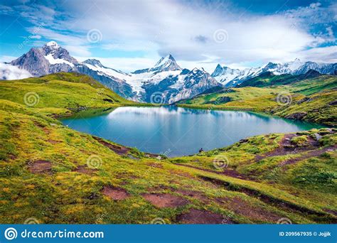 Picturesque Summer View Of Bachalpsee Lake With Schreckhorn Peak On
