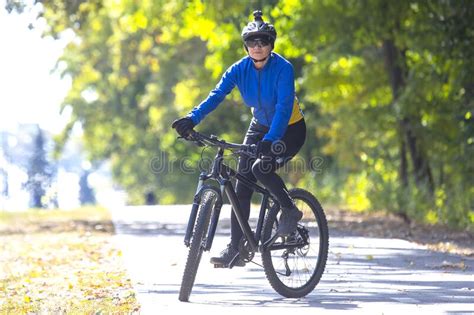 Beautiful Girl Cyclist Rides A Bicycle Healthy Lifestyle And Sport Stock Image Image Of