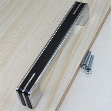 The kitchen is the busiest room in the house in most homes. Aliexpress.com : Buy 96mm fashion simple modern furniture handles shiny silver kitchen cabinet ...