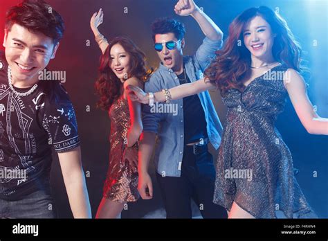 Young Men And Women Dance In The Bar Stock Photo Alamy