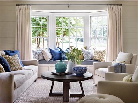 Bright Living Room With Built In Window Seat And Blue Accents