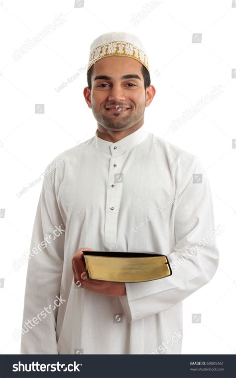 An Ethnic Mixed Race Man Wearing Cultural Clothing Is Holding A Book