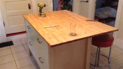 Its details are manifested in the beautiful finish of the solid wood. Ikea Varde Four Drawer Kitchen Island Assembly Tutorial ...