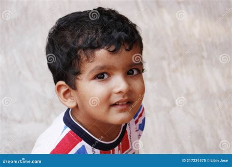 Young Indian Baby Boy In Close Up With White Background Stock Image