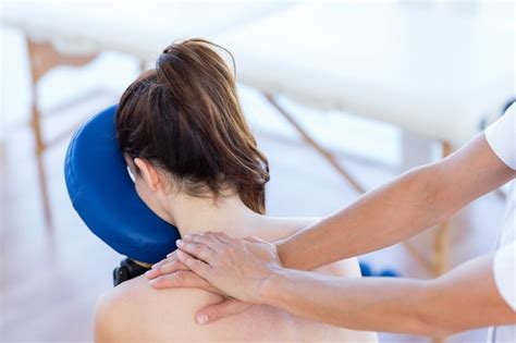premium photo woman having back massage