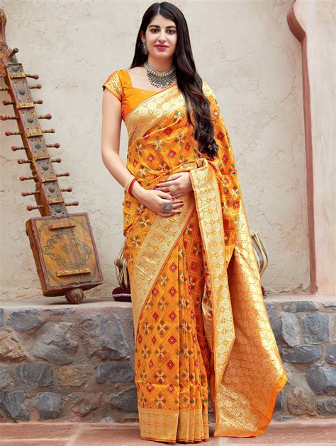 Mustard Yellow Banarasi Satin Silk Patola Print Woven Saree With Golden Border And Pallu