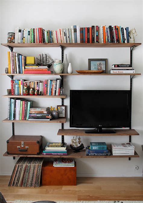 This steel side wall racking is the solution for your filling: DIY Wall-Mounted Shelving Systems Roundup | Apartment Therapy