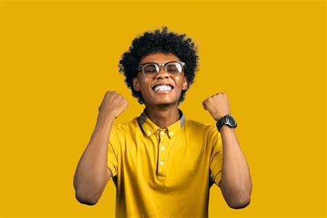 Excited African American Man With Accessories Showing Yes Gesture