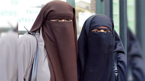 china bans burqa in xinjiang city with largest muslim population firstpost