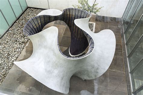 Zaha Hadid Architects Designed A Sinuous Concrete Shell For Its First