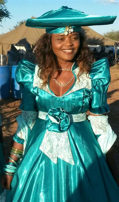 Their gorgeous dresses, elaborate headpieces, and vibrant patterns showcase their pride in their identity. Herero woman Namibia Africa | African dresses for women ...