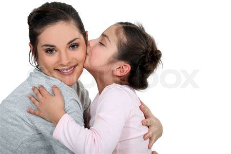 Daughter Kissing Her Mum Stock Image Colourbox
