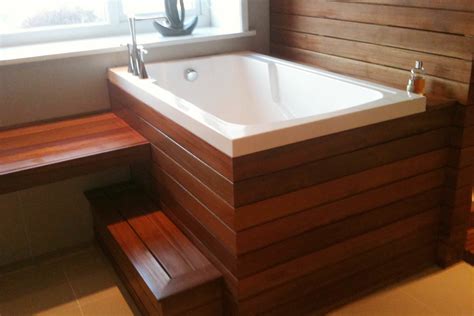 They are much deeper which lets you sit naturally upright, so the tub doesn't need tubs can be partly sunk for easier access, as in this tub from zen bathworks. Deep Soaking Tub, Durham, England - Cabuchon