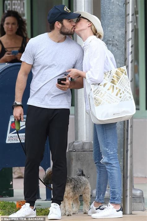 Emily Vancamp And Josh Bowman Lean In For A Kiss As They Enjoy Retail