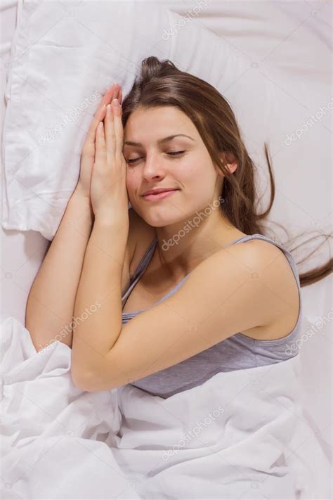 Relaxing And Peaceful Sleeping Woman Stock Photo By ©mitastockimages