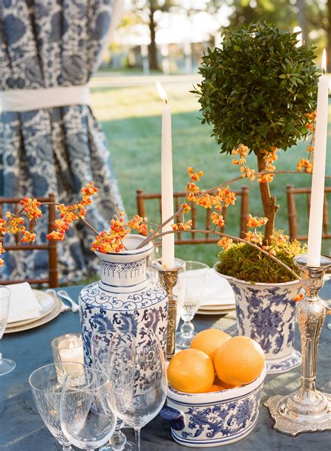 Tablescape With Blue Chinoiserie Vases And Orange Accents Chinoiserie