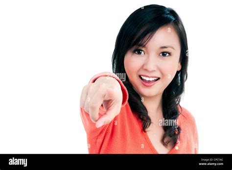 Happy Young Woman Pointing Stock Photo Alamy