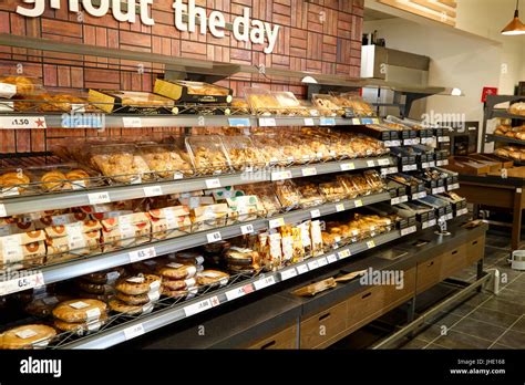 Freshly Baked Goods Aisle In A Uk Tesco Supermarket Stock Photo