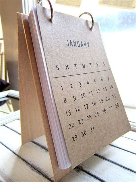 A 2012 Desk Calendar Organizer With Wood Covers The Calendar Is