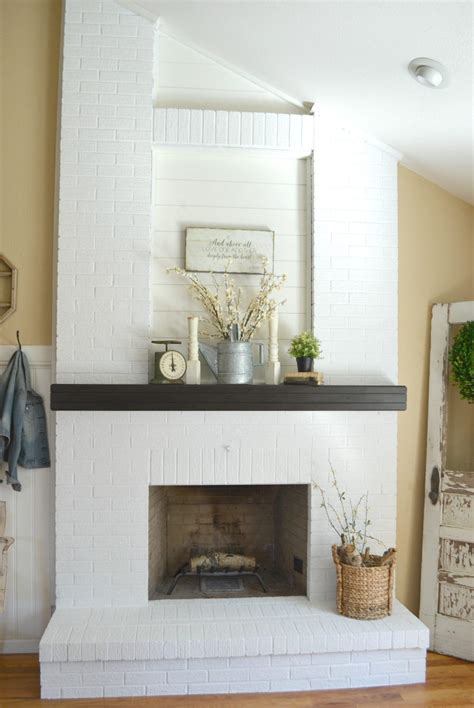 Next take the painters tape and tape around the fireplace so the paint will not touch the black part of the fireplace. How to Paint a Brick Fireplace in 3 Simple Steps | Brick ...