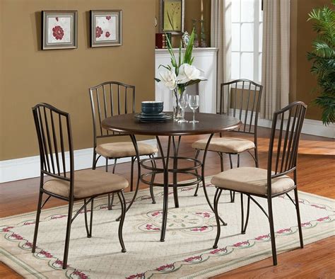 The dining table has four straight legs and a rectangular tabletop. 5 PC. Set Kings Brand Round Wood & Metal Dining Room ...