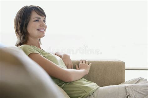 Woman Relaxing On Sofa Stock Photo Image Of Relaxation 29657704