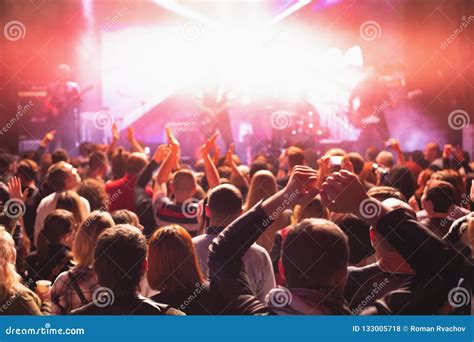 A Concert Crowd Of People Applauds The Artist Editorial Stock Photo