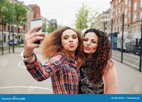 Beautiful Pouting Women Taking A Selfie Stock Image Image Of Making Enjoyment 59026901