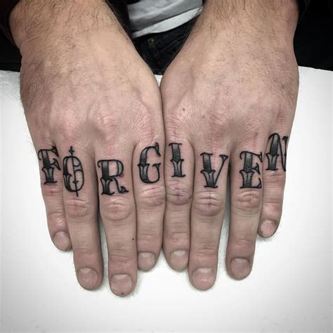 Word ‘forgiven Inked On All Of Both Hands Fingers Forgiveness