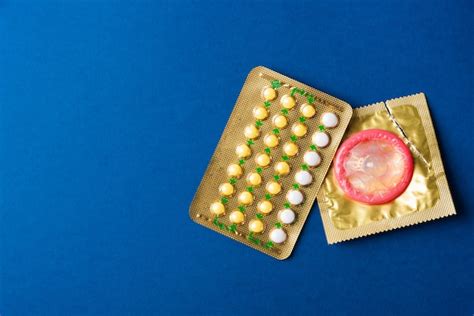 premium photo condom safe sex birth control pill contraceptive