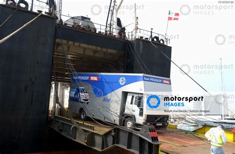 A Team Peugeot Total Support Vehicle Is Loaded Onto The Southern