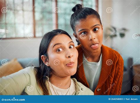 Selfie Mother And Daughter With Funny Comic Face And Bonding In Home