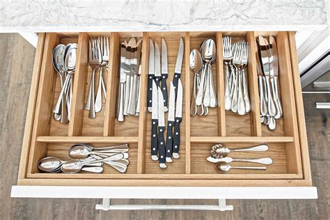 A Custom Made Cutlery Tray To Store Tableware Such As Knives Forks And