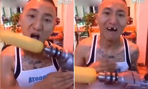 Excruciating Moment A Man S Front Teeth Are Ripped Out From The Rotating Corn Challenge Daily