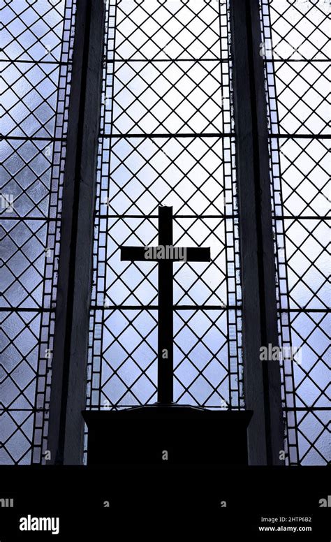 Backlit Cross In Leaded Church Window Norfolk England Stock Photo Alamy