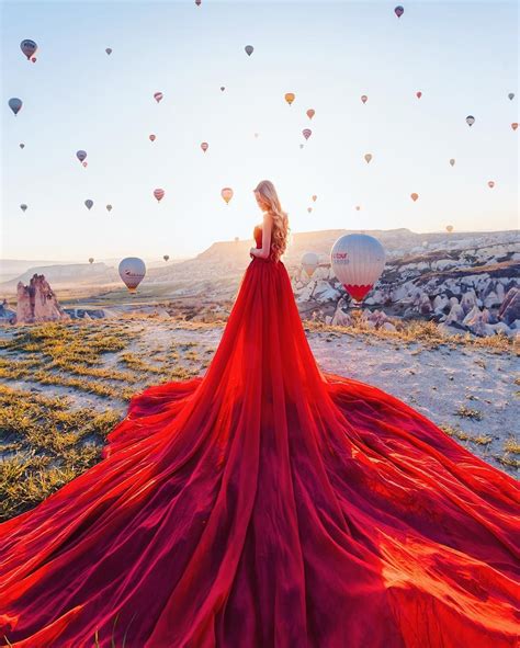 russian photographer kristina makeeva captures women in dresses set against magical landscapes