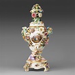 A large Meissen porcelain flower-encrusted pot-pourri vase, cover and ...