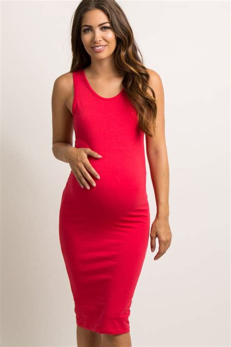 A Solid Hued Fitted Maternity Dress Featuring A Rounded Neckline And A