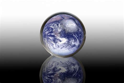 Earth In A Crystal Ball Conceptual Image Photograph By Victor De