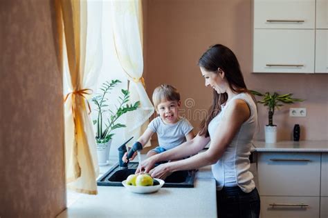 Kitchen Mom Son Wash Fruits And Vegetables Stock Image Image Of