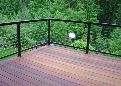 The other deck railing has metal and wood concept with there is a grey colored desk railing which is built on the home balcony. Horizontal Deck Railing: The Advantages and Disadvantages ...