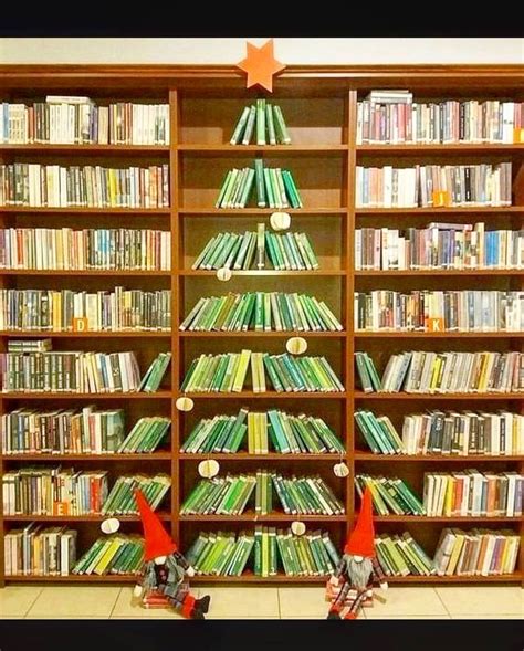 A Christmas Tree Library Shelf Display Made And Posted On Instagram By