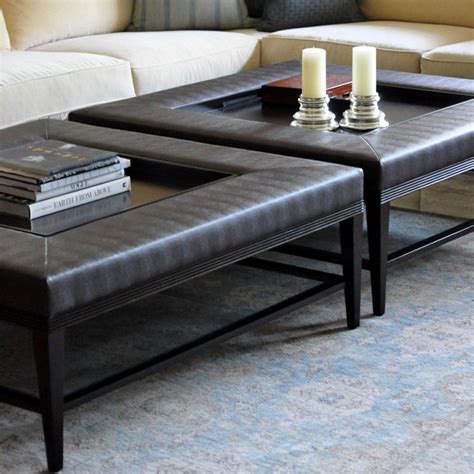 Turned wooden legs on brass casters. Modern square coffee table with leather details #leathe ...