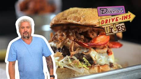 Guy Fieri Eats A Surf N Turf Burger Diners Drive Ins And Dives
