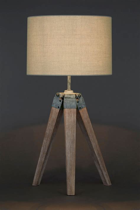 Floor lamps are tall standing lamps designed to stand on the floor and position light higher in the room.a floor lamp usually includes these common design features:. Buy Wooden Tripod Table Lamp from the Next UK online shop £55 | Tripod table lamp, Led floor ...