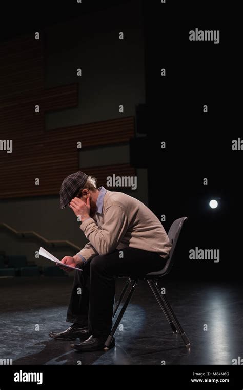 Male Actor Reading Script On Stage Stock Photo Alamy