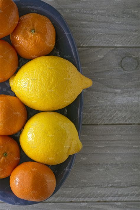 Lemons And Mandarin Oranges High Quality Food Images Creative Market