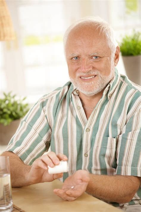 Smiling Old Man Taking Medication Stock Image Image Of Domestic