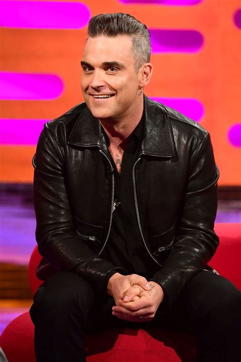 robbie williams shocks fans by telling lewd tales in very bizarre appearance on the graham